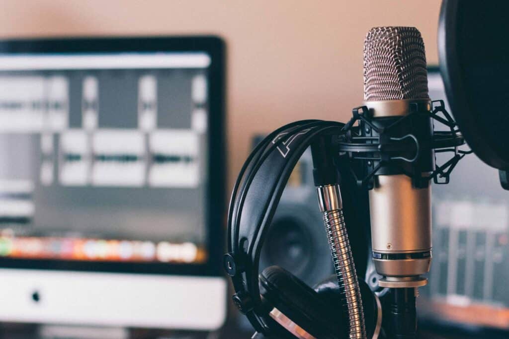 How Entrepreneurs Use Podcasts to Build Wealth in 2026 will francis ZDNyhmgkZlQ unsplash 1 2 1